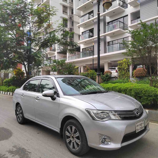 Toyota Axio  – চমৎকার পারিবারিক ও ব্যক্তিগত ব্যবহারের উপযোগী একটি নির্ভরযোগ্য গাড়ি